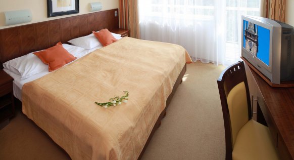 spa-resort-sanssouci-blue-house-deluxe-suite-bedroom.jpg
