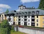 Gebäudeansicht des Spa Hotel Děvín in Marienbad mit markanter Fassade und Balkonen